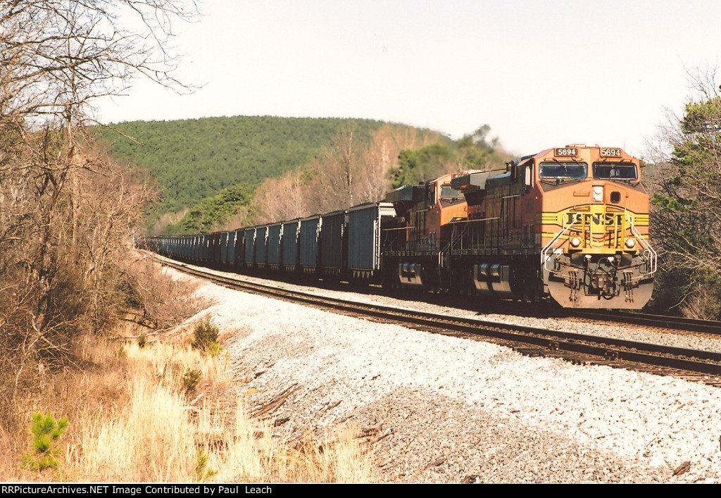 Loaded coal train rolls east